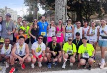 Orgulho municipal: Atletas representam o município de Cruzeiro da Fortaleza na “Corrida do Milho” em Patos de Minas.